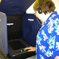 Nancy Ward using the iVotronic Voting Machine